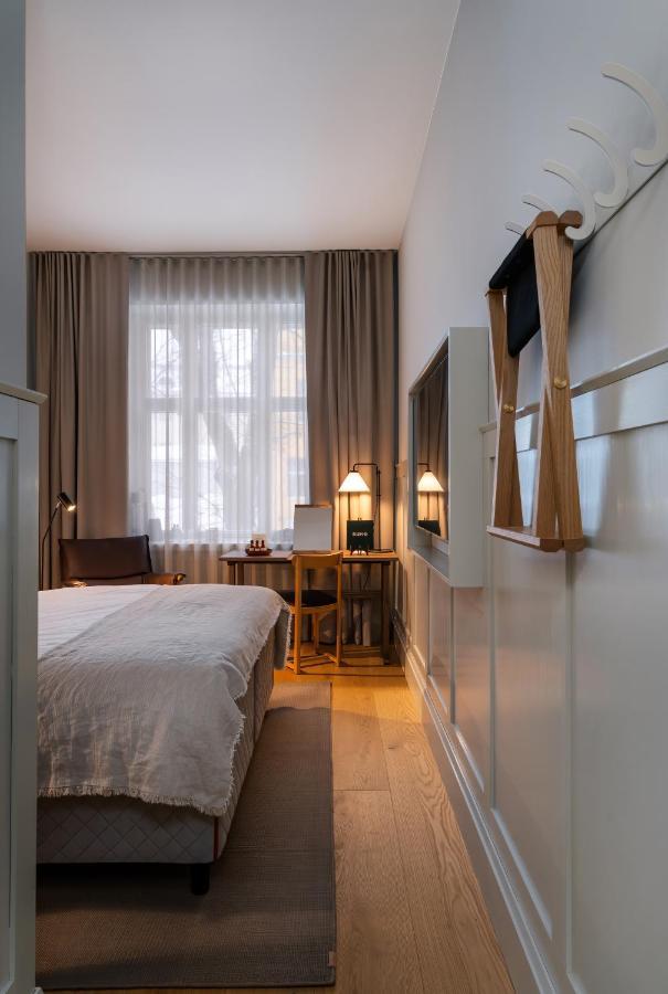 RUNO Hotel Porvoo Buitenkant foto A room at the hotel